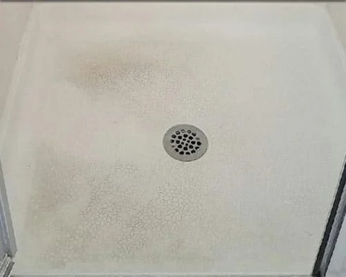 Shower floor before cleaning